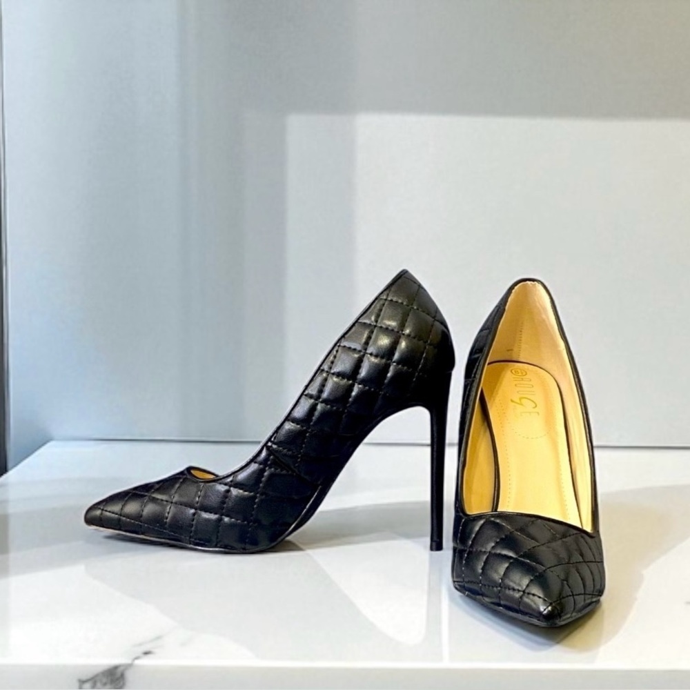 Black quilted classic pointy toe stiletto heels
